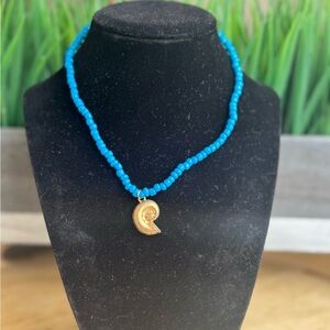 Blue Beaded Necklace with Gold Pendant